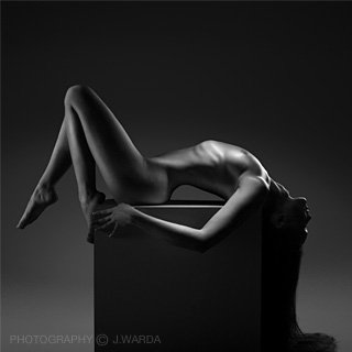 nude female model reclining on cube photo by j.warda the naked pixel photography 